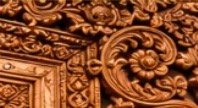 Close-up of an ornate carved wooden panel